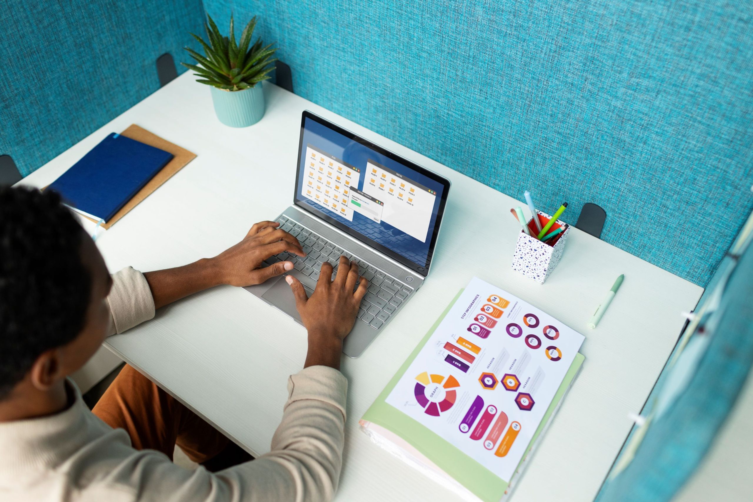 high-angle-woman-working-laptop